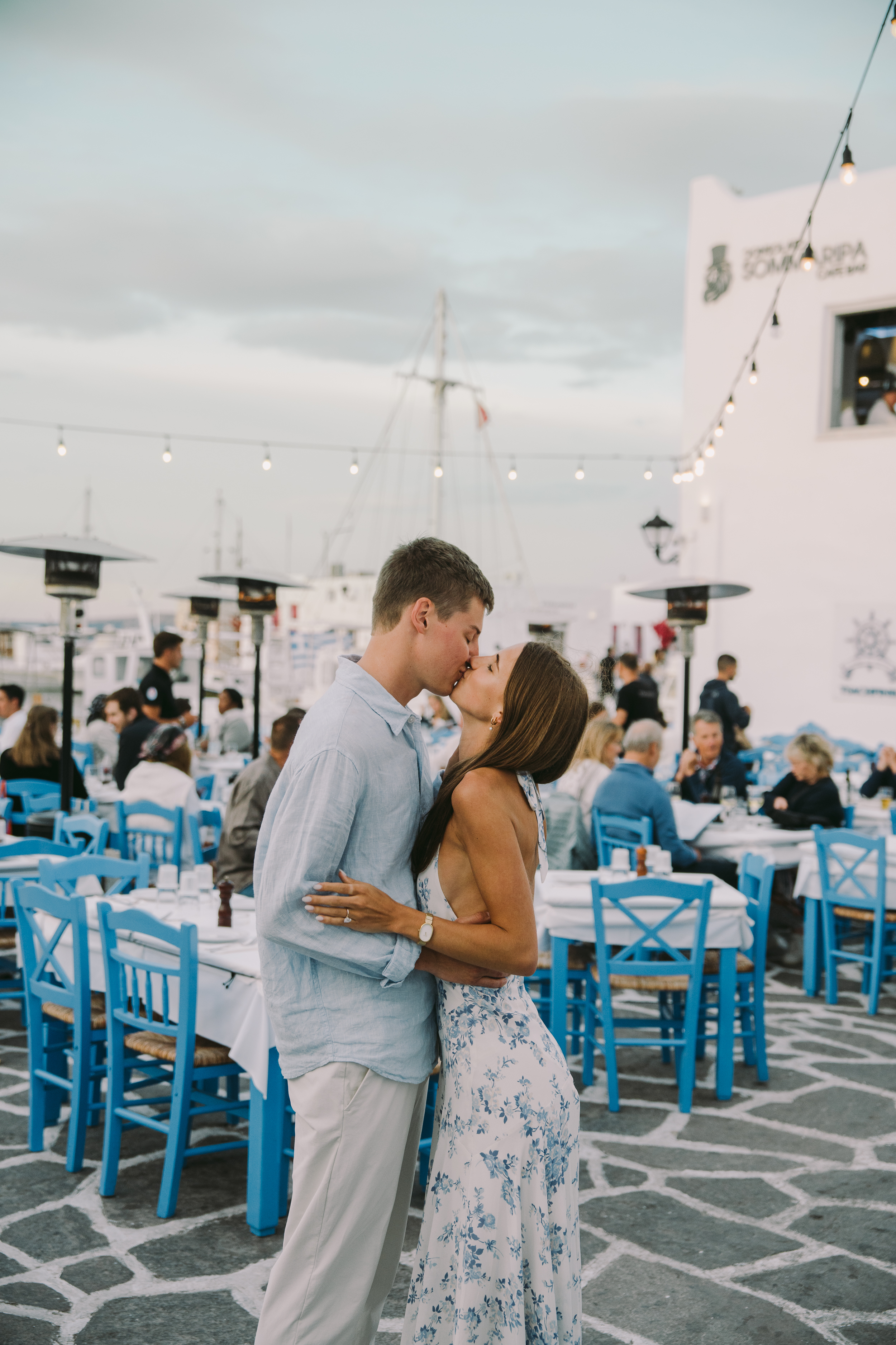 Newly engaged couple enjoying the evening in Paros