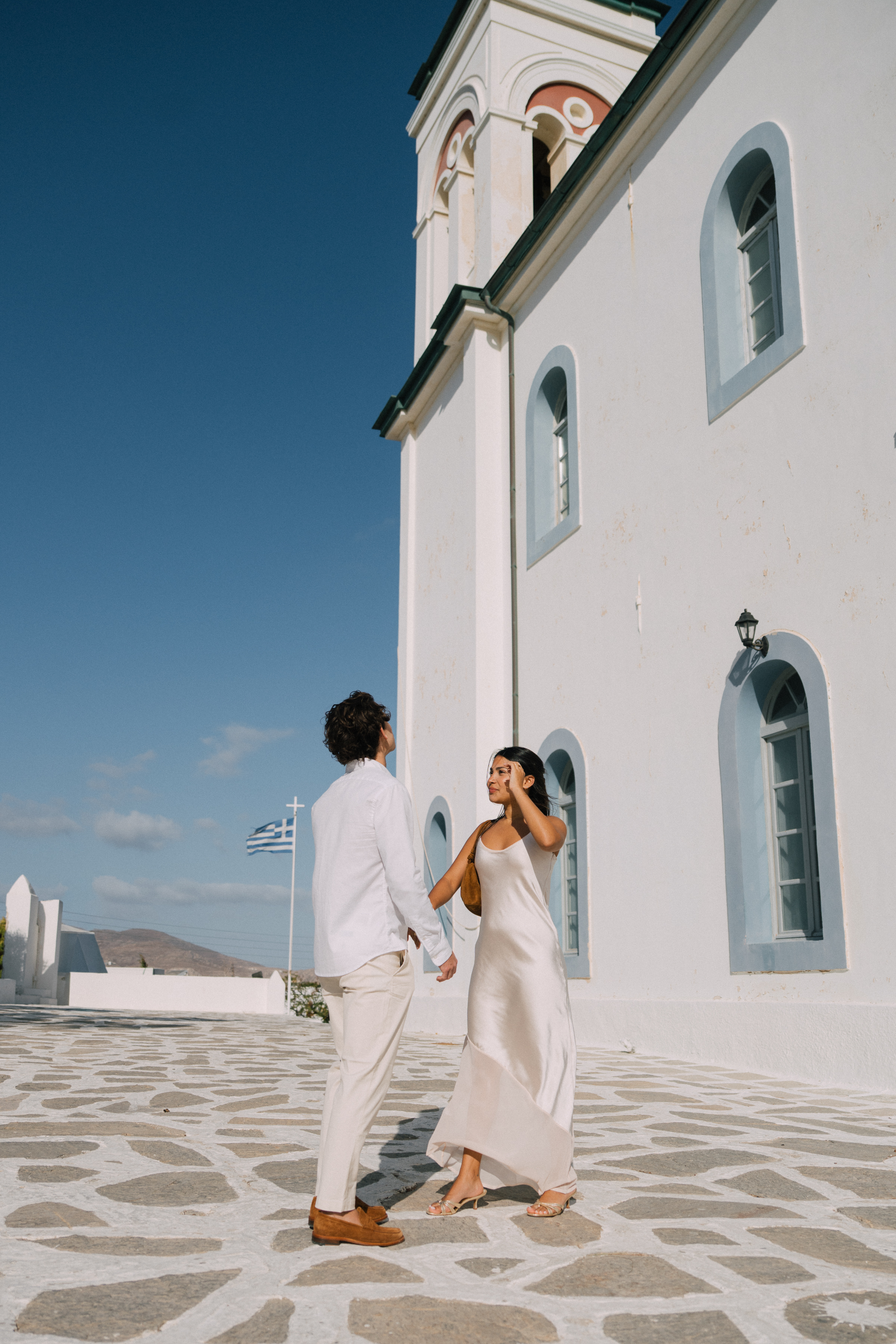 Man proposing to his partner in Naoussa, Paros Island
