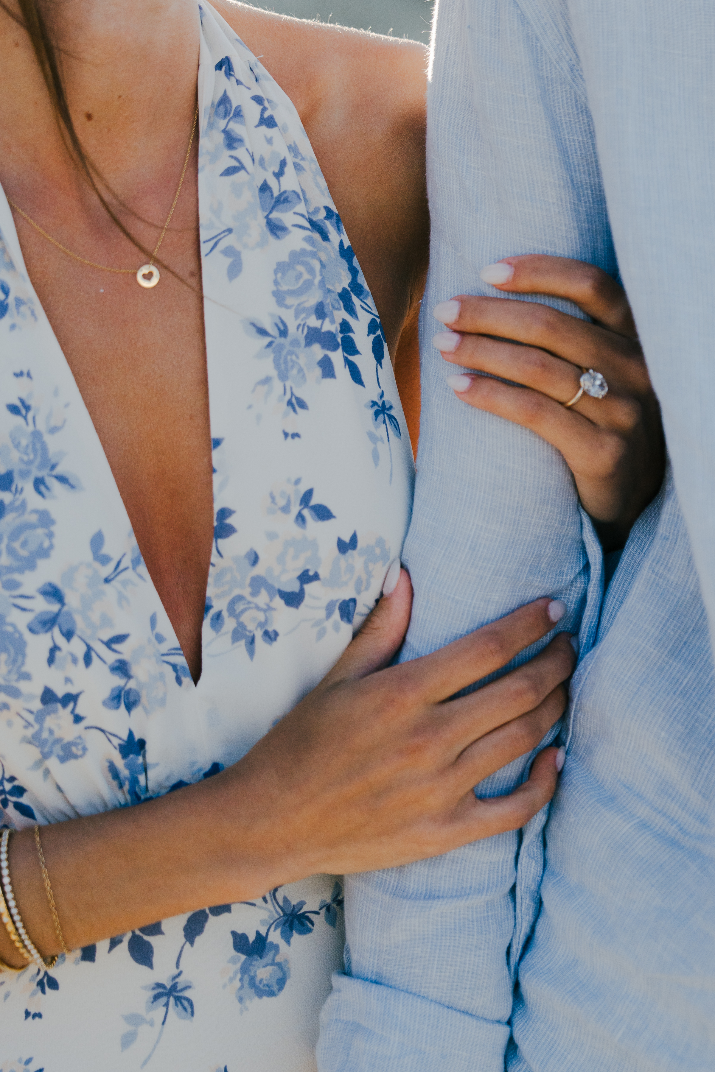 Newly engaged couple enjoying sunset in Paros
