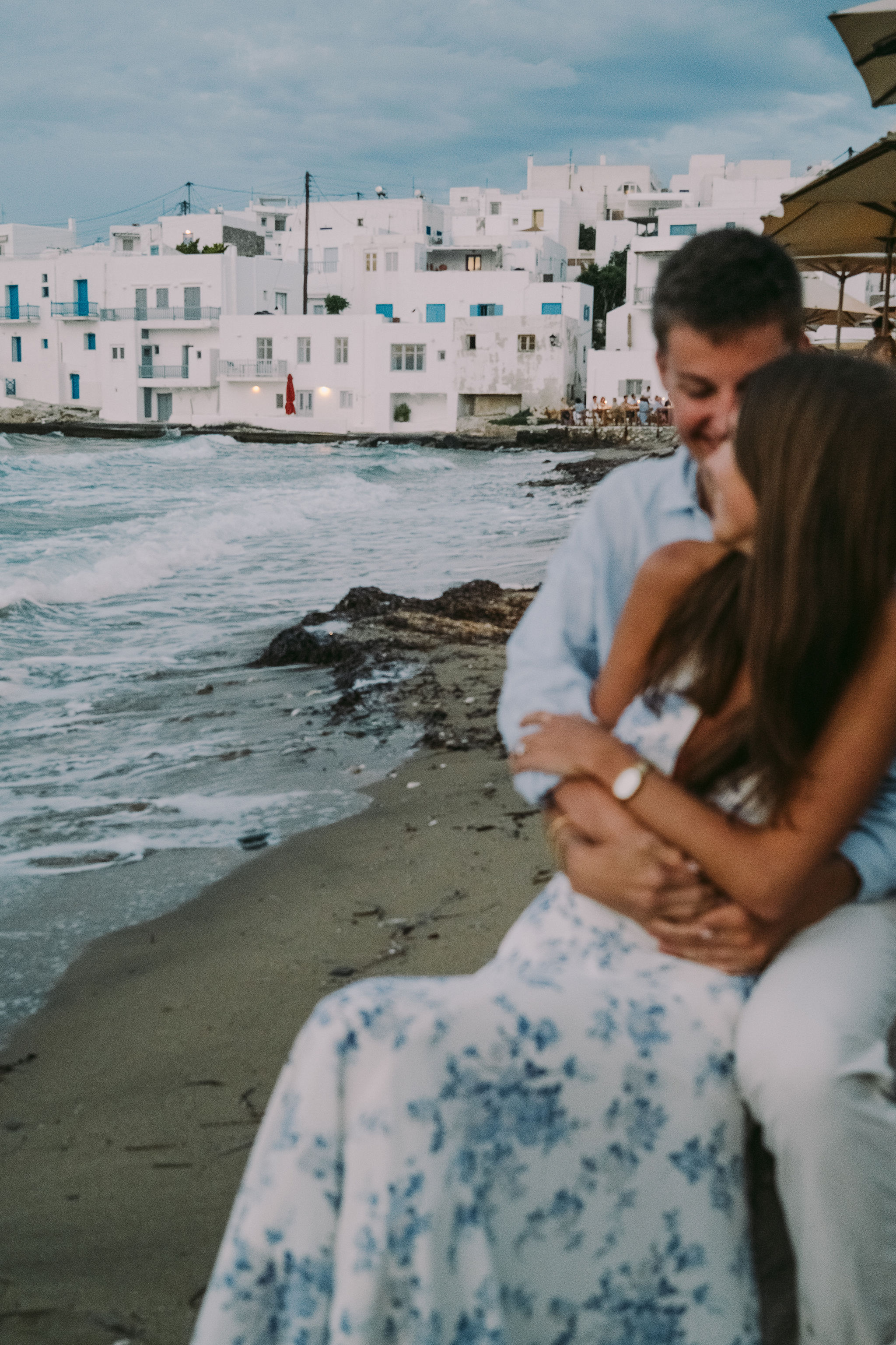 Newly engaged couple enjoying the evening in Paros