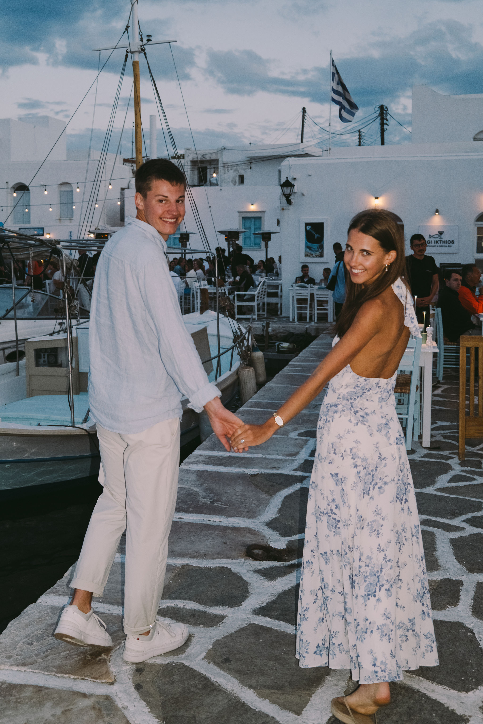 Newly engaged couple enjoying the evening in Paros