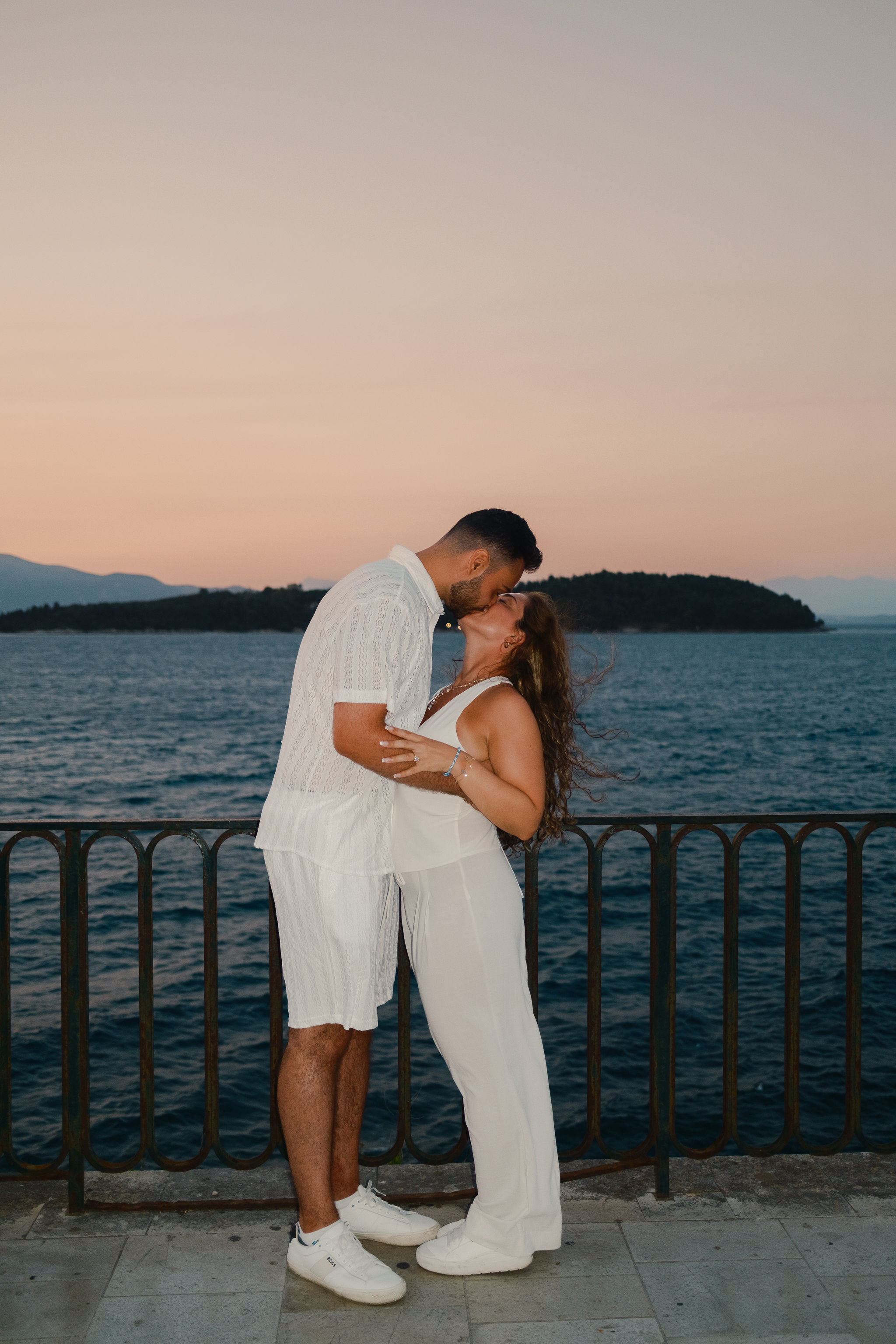 Romantic couple portrait during sunset in Corfu