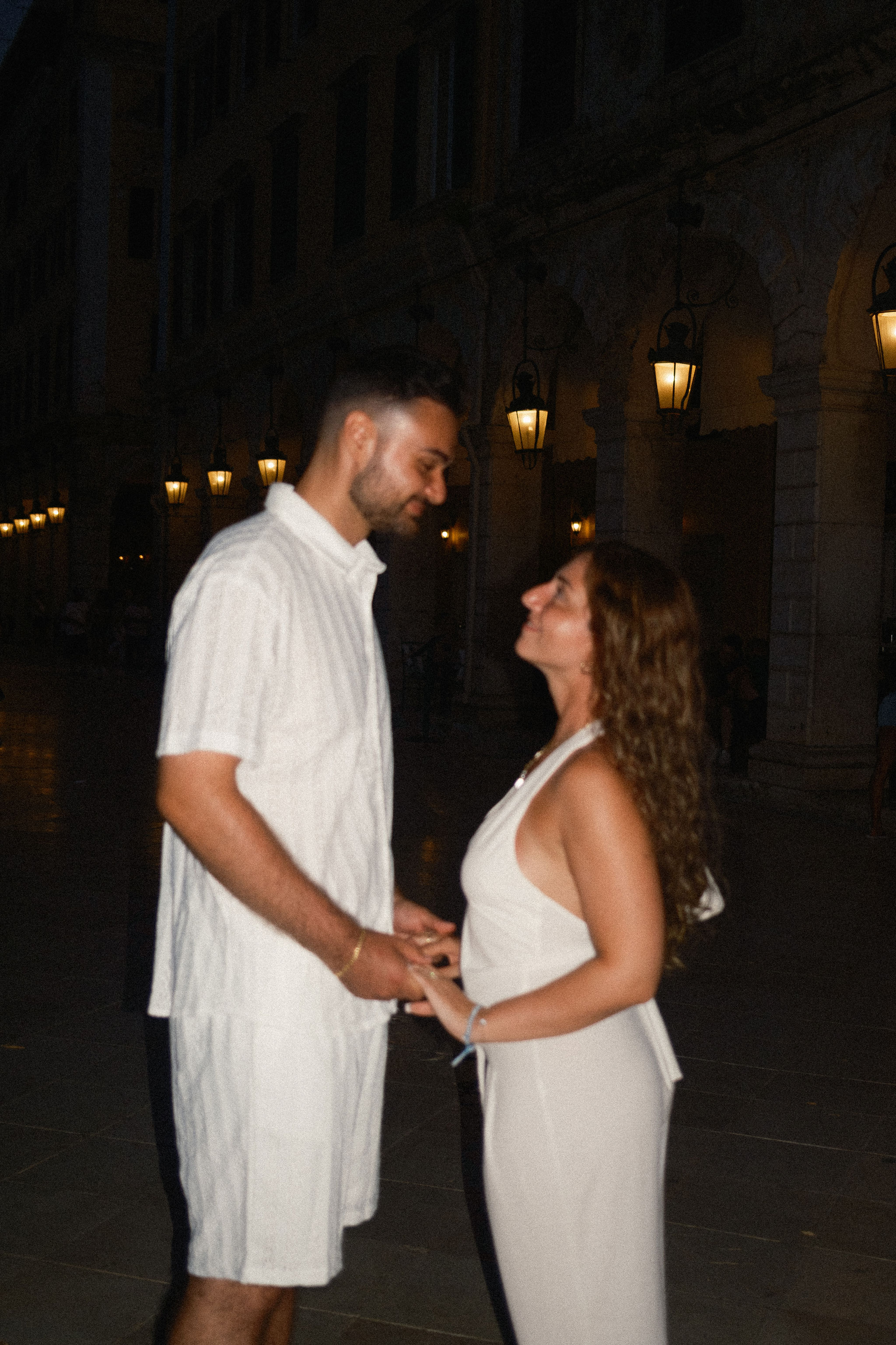 Surprise proposal in Corfu, Greece, by the sea at sunset