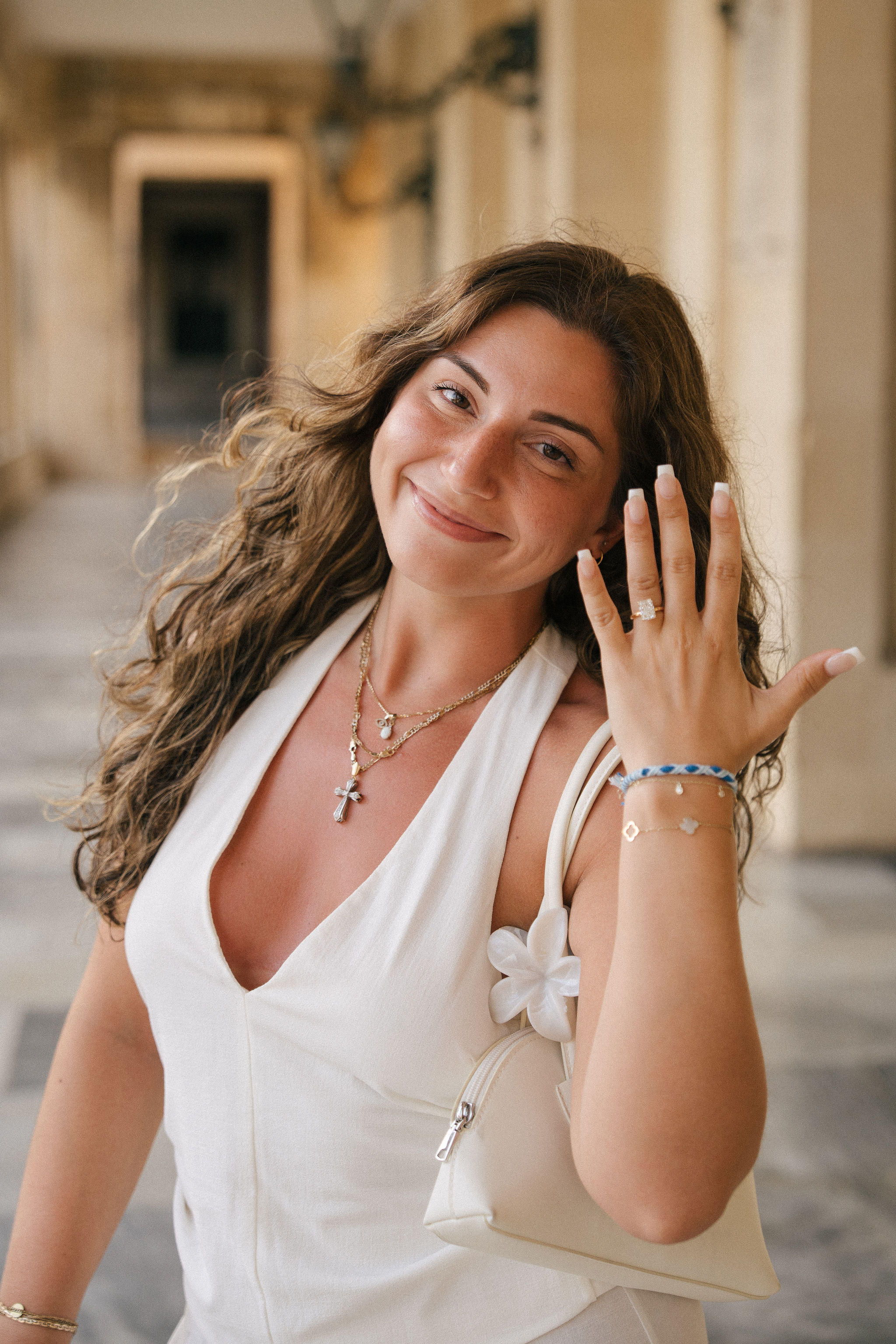 Surprise proposal in Corfu, Greece, by the sea at sunset
