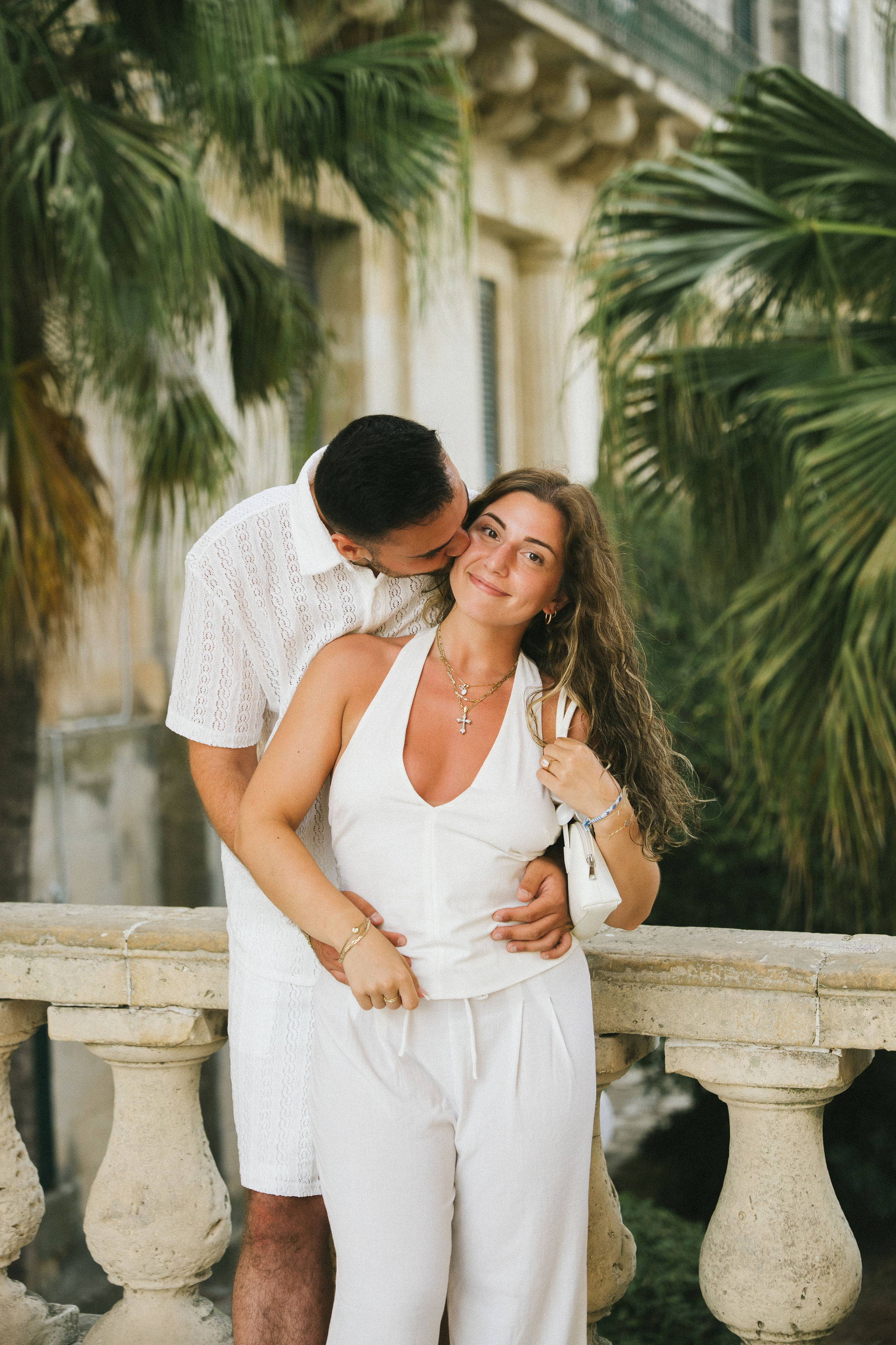 Romantic portrait of newly engaged couple in Corfu