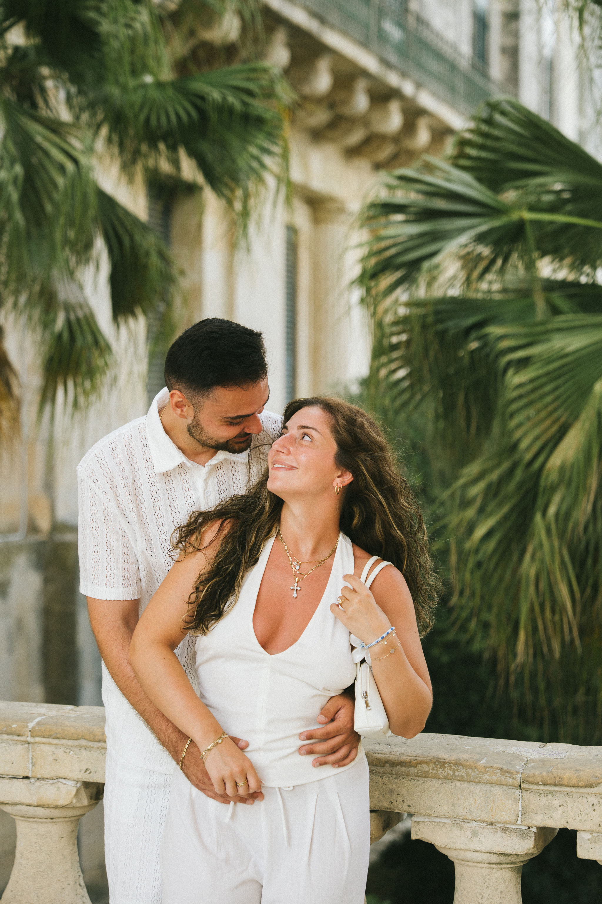 Newly engaged couple celebrating their surprise proposal in Corfu, Greece