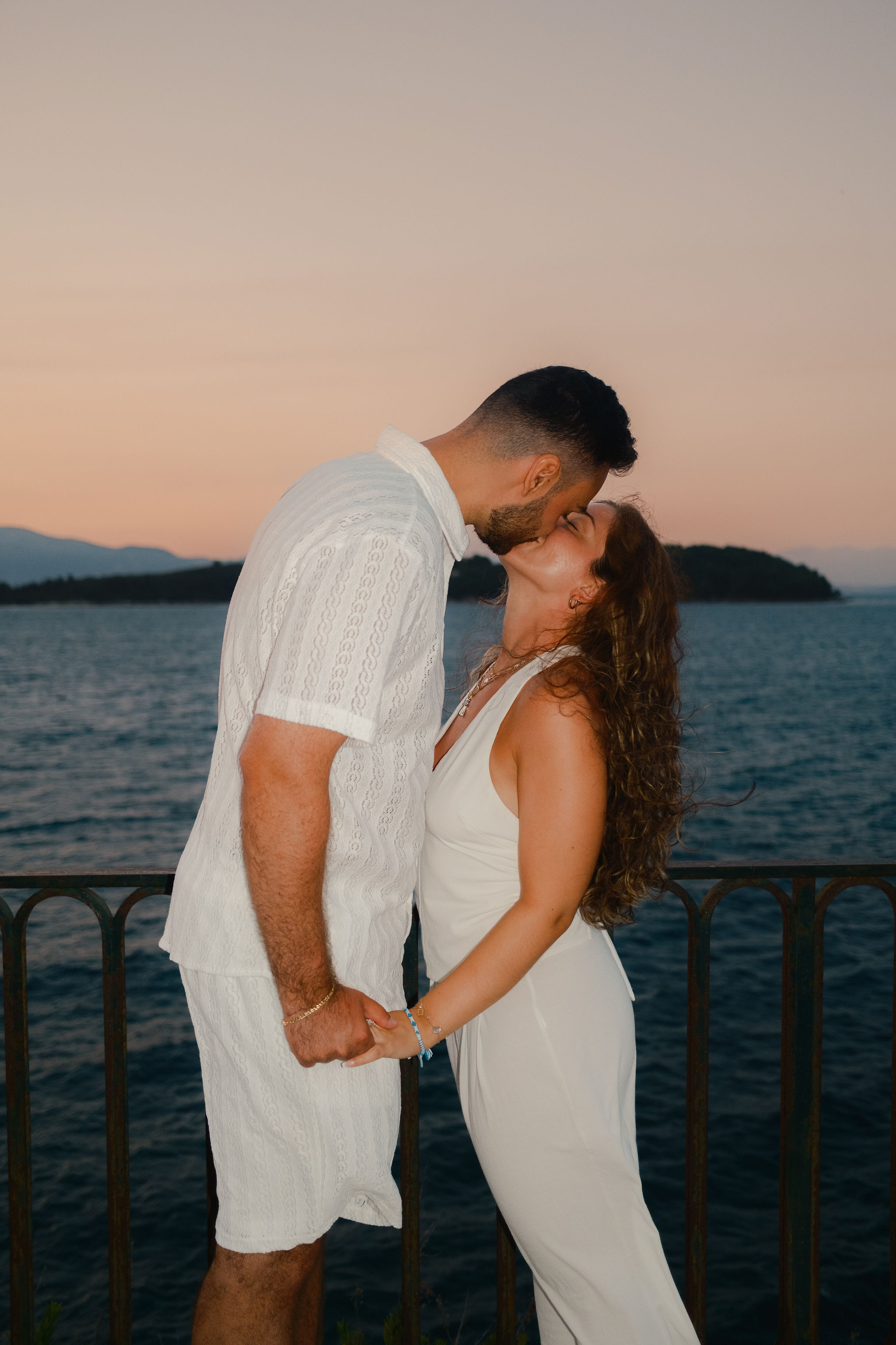 Romantic couple portrait during sunset in Corfu